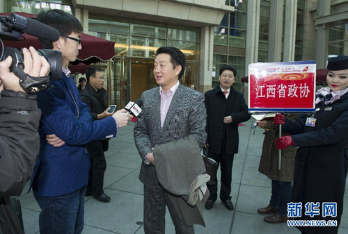 楊文龍董事長出席全國政協(xié)十二屆二次會議